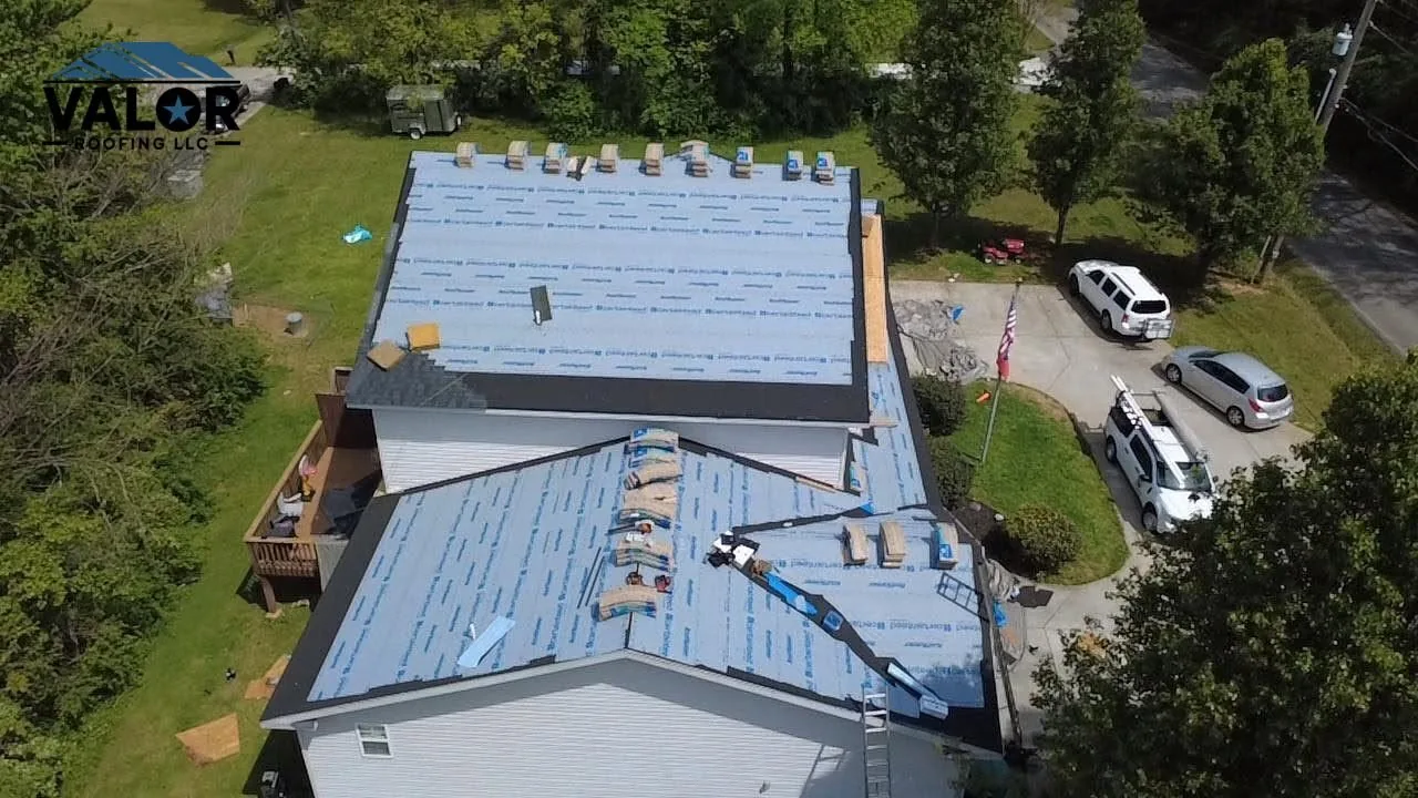 Drone view of a roof covered in synthetic underlayment before the shingles go on